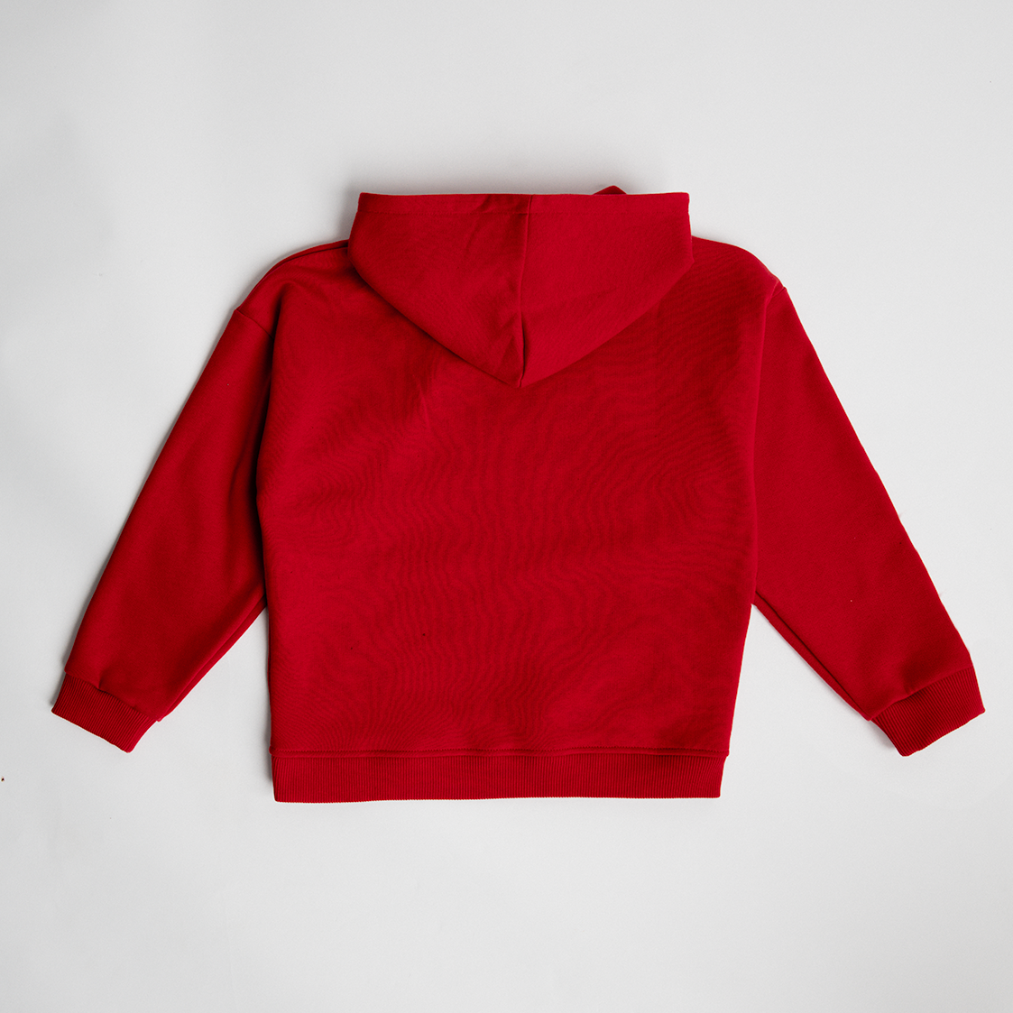 WMB - Oversized Hoodie Red showing back view of cozy oversized cotton hoodie with double-layered hood and clean stitching.