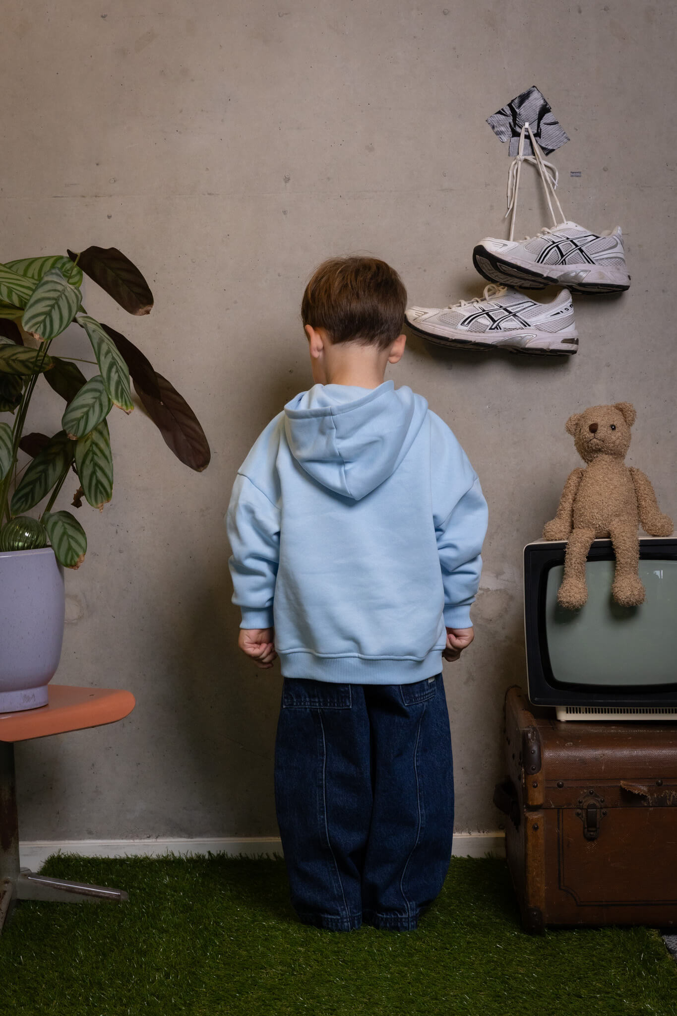 Kid rocking the cozy FIT #1 hoodie, ready to conquer the world one step at a time Toddie