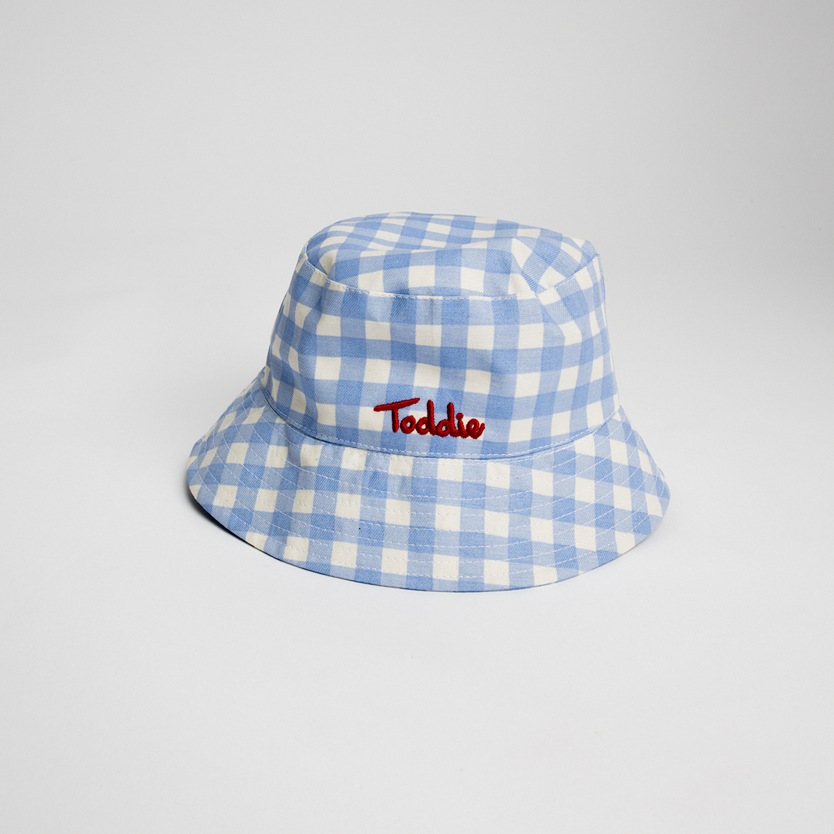 Blue gingham bucket hat soft, breathable, perfect for sunny days, stylish and functional Bucket Hat Gingham Toddie